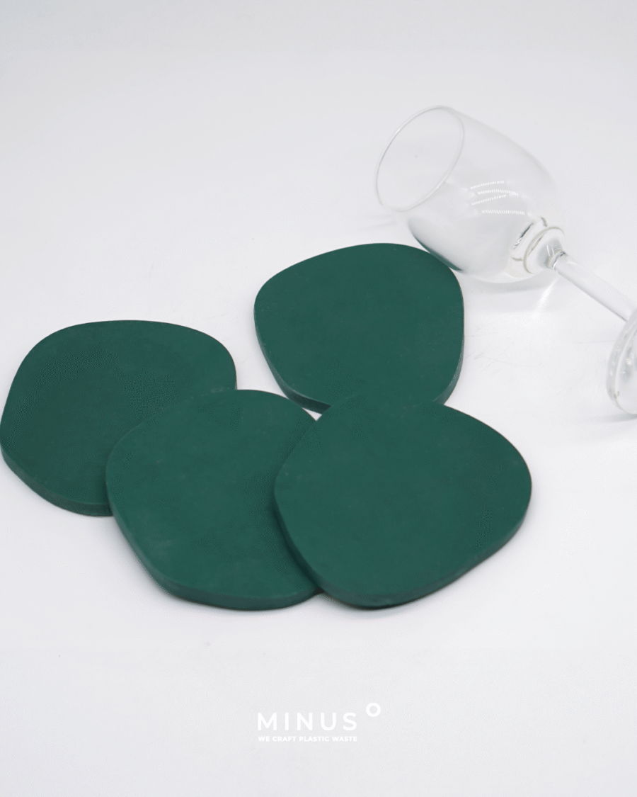 Upcycled plastic coaster with smooth matte finish and circular design