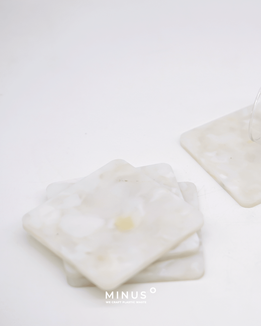 Handcrafted recycled plastic coaster with natural matte texture